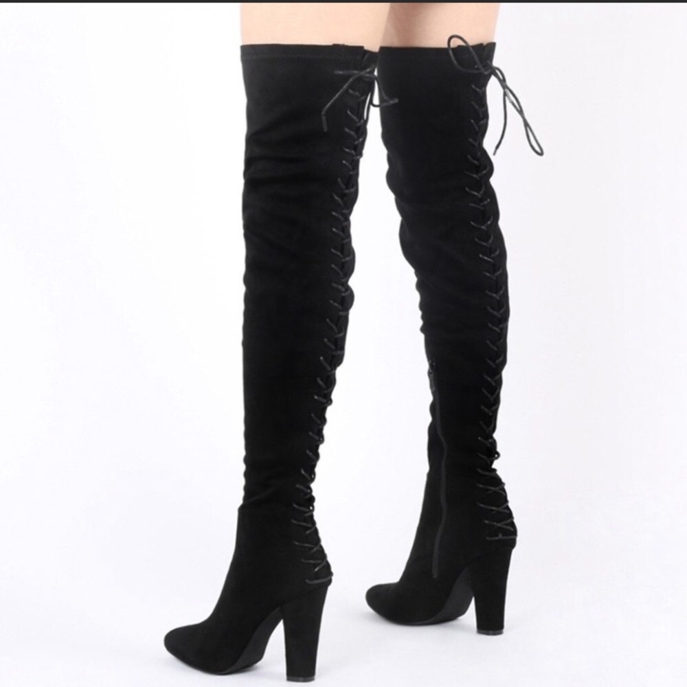 Thigh high black boots